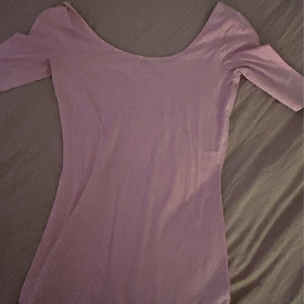 Pink long shirt with sleeves cut off at elbows